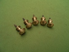 5 alte Messingköpfe